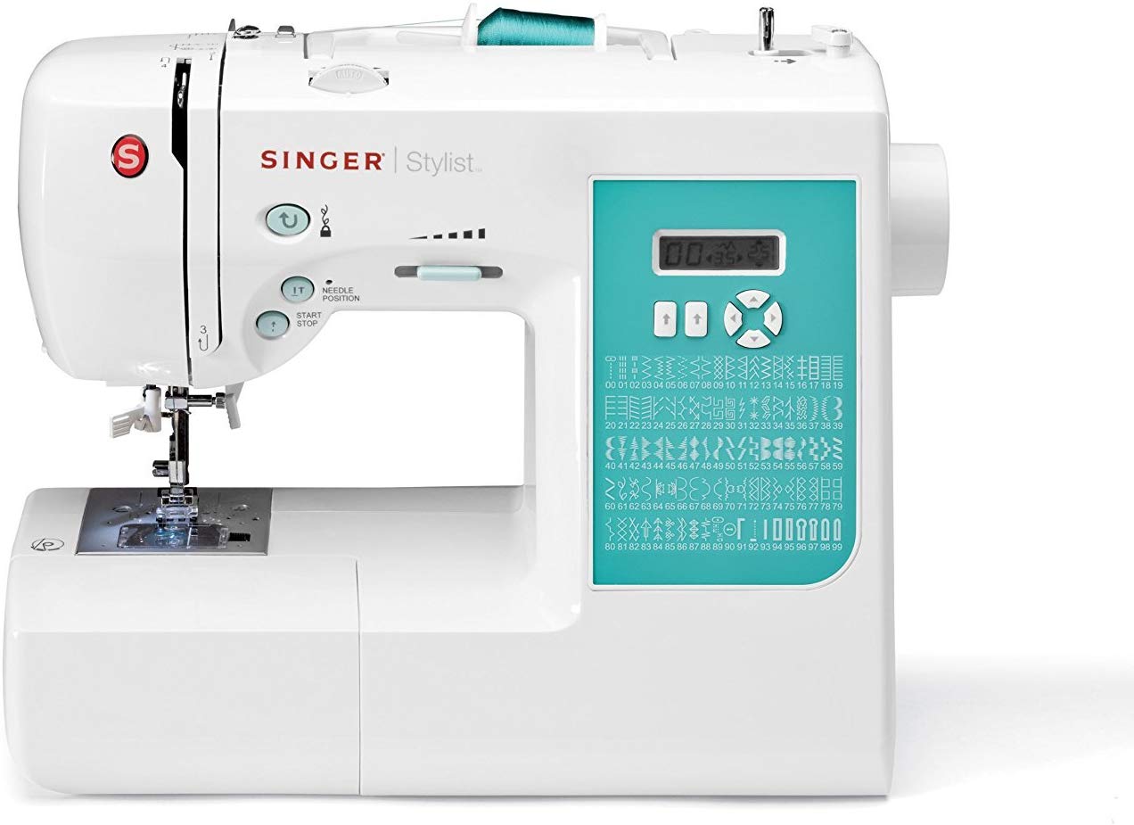 singer 7258 computerized sewing machine isolated on white background