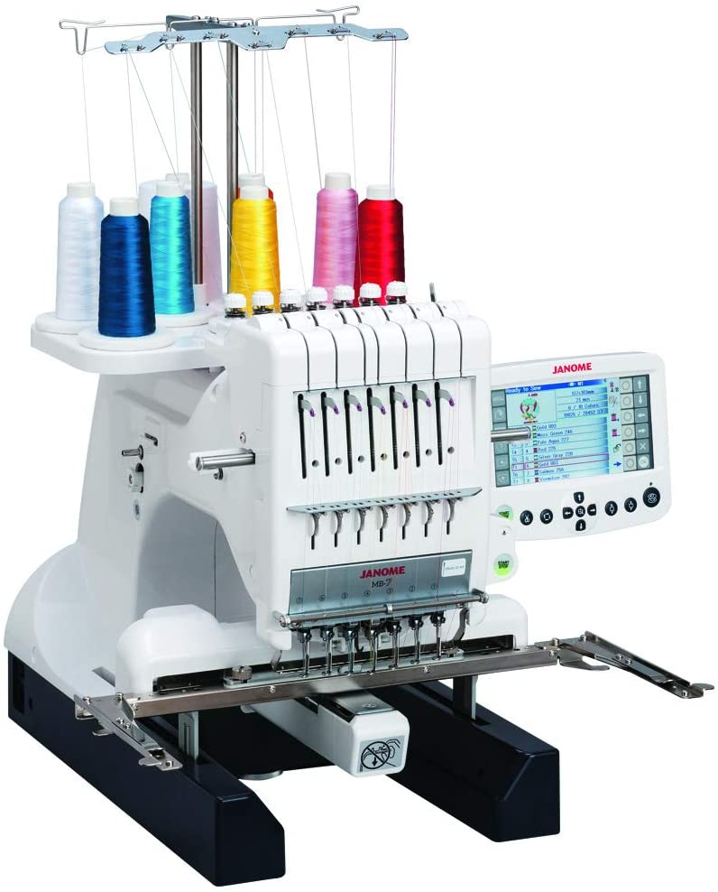 janome 001mb7 multi needle embroidery machine isolated on white background